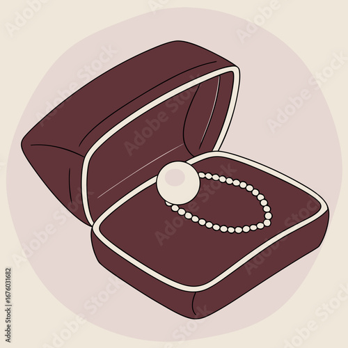 Elegant pearl necklace displayed in an open velvet jewelry box