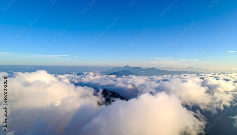 Naklejka premium Aerial view of clouds and mountains