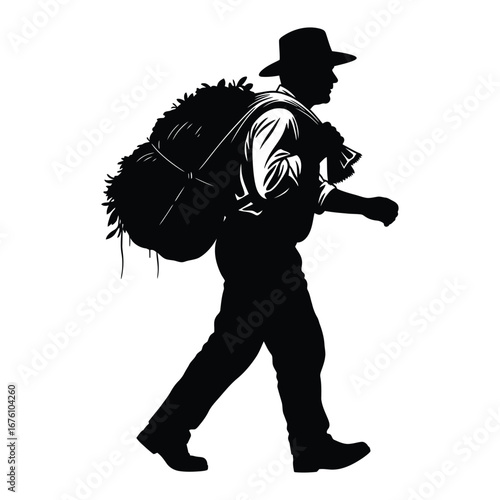 Silhouette of a man wearing a hat carrying a large bundle of leaves on his back person