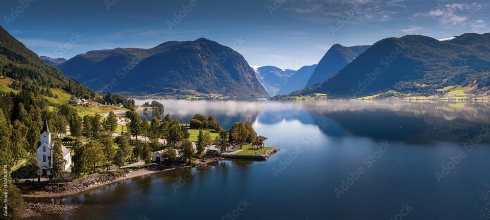 Naklejka premium panorama view of Helgheim church and village in Vestland County of Norway