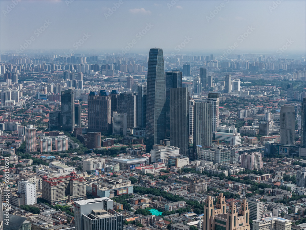 Fototapeta premium Aerial view of Tianjin city skyline at dusk time, Tianjin, China