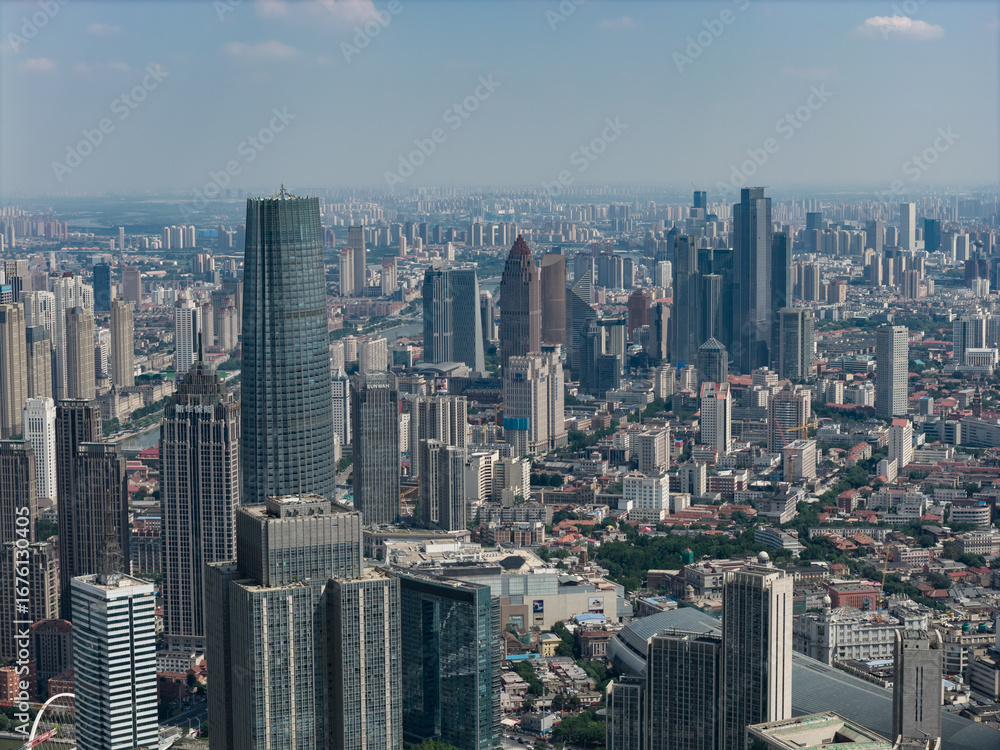 Obraz premium Aerial view of Tianjin city skyline at dusk time, Tianjin, China