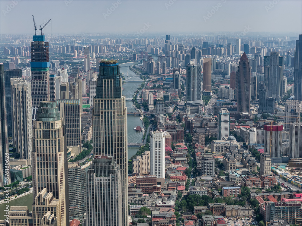 Fototapeta premium Aerial view of Tianjin city skyline at dusk time, Tianjin, China