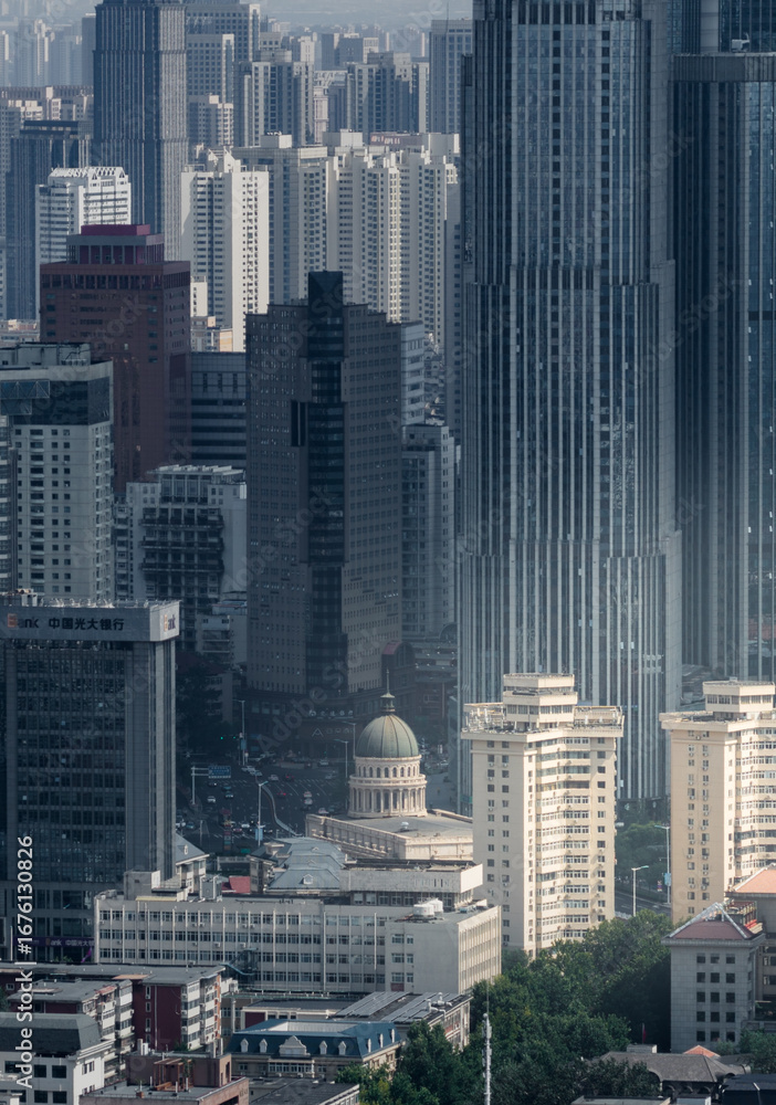 Fototapeta premium Aerial view of Tianjin city skyline at dusk time, Tianjin, China