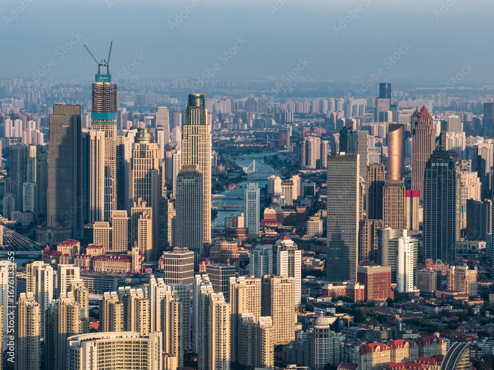 Fototapeta premium Aerial view of Tianjin city skyline at dusk time, Tianjin, China