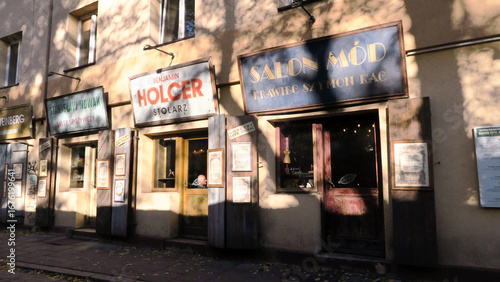 Kraków, Poland. Szeroka street, is disguised to look like a row of early 20th century trade shops and is decorated with relating to the area's Jewish heritage, in Kazimierz.