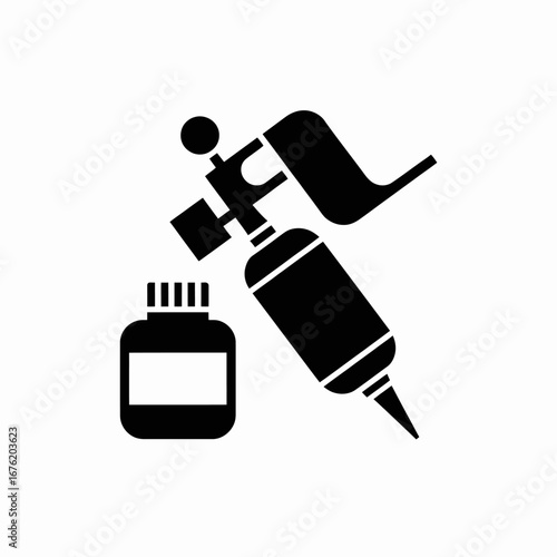 Black silhouette of a tattoo machine and ink bottle on a white background