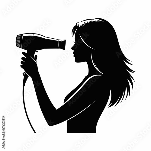 Silhouette of a woman drying her hair with a hairdryer