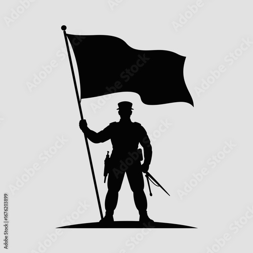Silhouette of a soldier holding a large flag on a battlefield