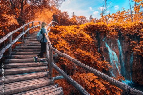 Young woman with backpack w...