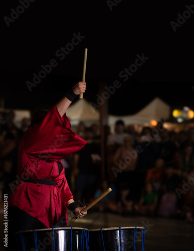 Red musicians in Kumi-daiko performance
