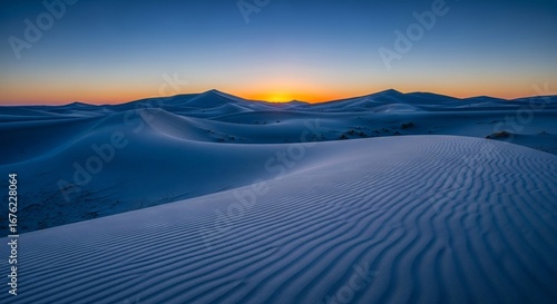 Serene Desert Sunset: Dramatic Blue Hour Landscape with Sand Dunes and Mountains