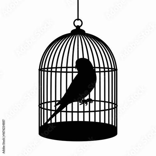 Silhouette of a parakeet perched inside a decorative birdcage