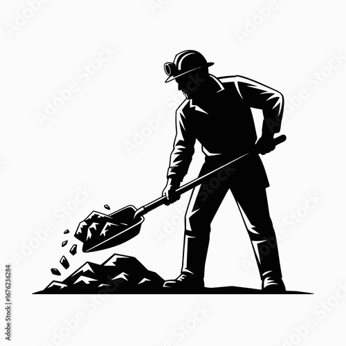 Silhouette of a miner digging coal with a shovel in a mine