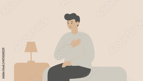 A man, seated, appears to be experiencing chest pain, possibly illness or distress.