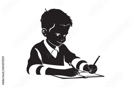 Young boy diligently writing at a desk