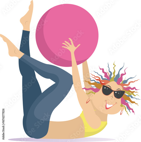 Young woman does exercises with a ball. 
Fitness. Cheerful beautiful female doing exercises with fitness ball
