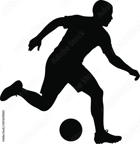 Dynamic silhouette of a soccer player in mid-run kicking the ball on silhouette