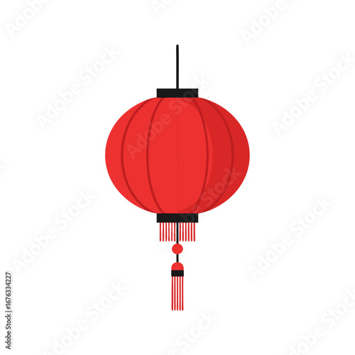 Red round hanging lantern with tassel used as traditional Chinese New Year decoration and festive ornament.