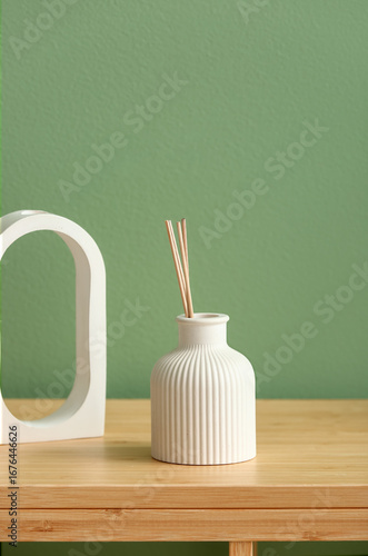Bottle of reed diffuser on ...