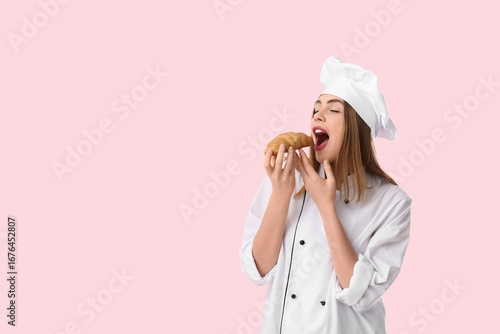 Young female chef eating cr...