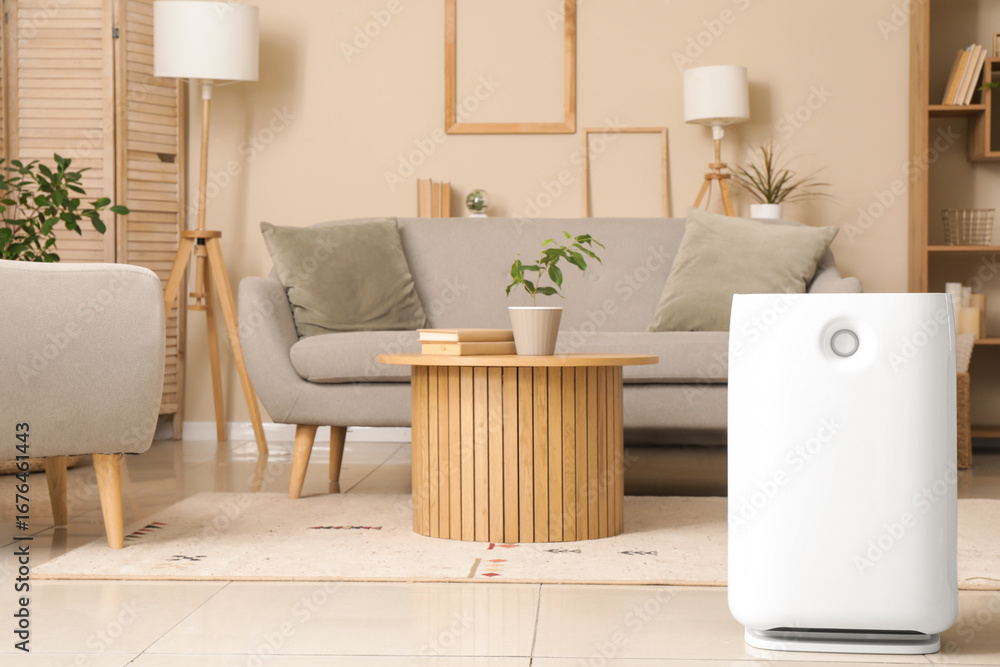 Fototapeta premium Modern humidifier on floor in living room