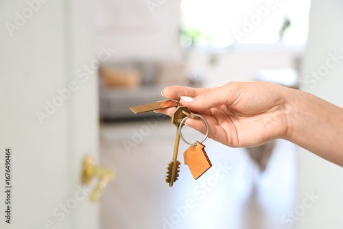 Female hand with key from f...