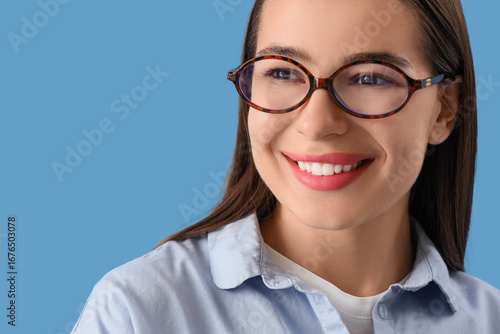 Young woman in stylish eyeg...