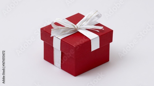 A vibrant red gift box with a large white satin ribbon tied in an elegant bow, set against a clean white background,