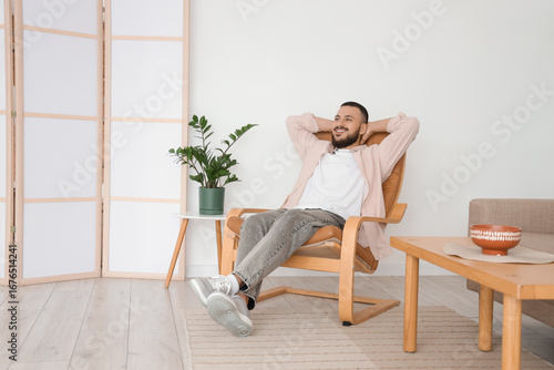 Handsome man resting in bro...