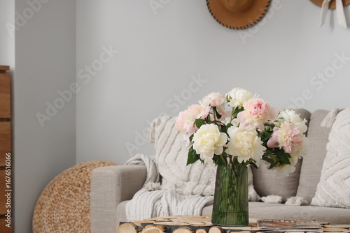 Vase with bouquet of beauti...
