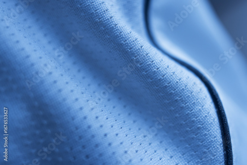 Macro detail of white breathable perforated fabric for sportswear