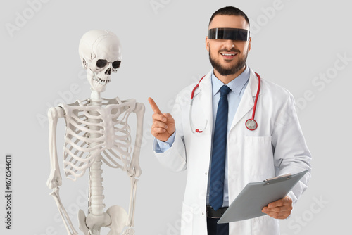 Male doctor in AR glasses w...