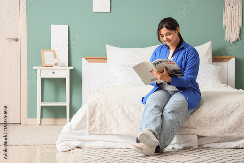 Beautiful young woman readi...