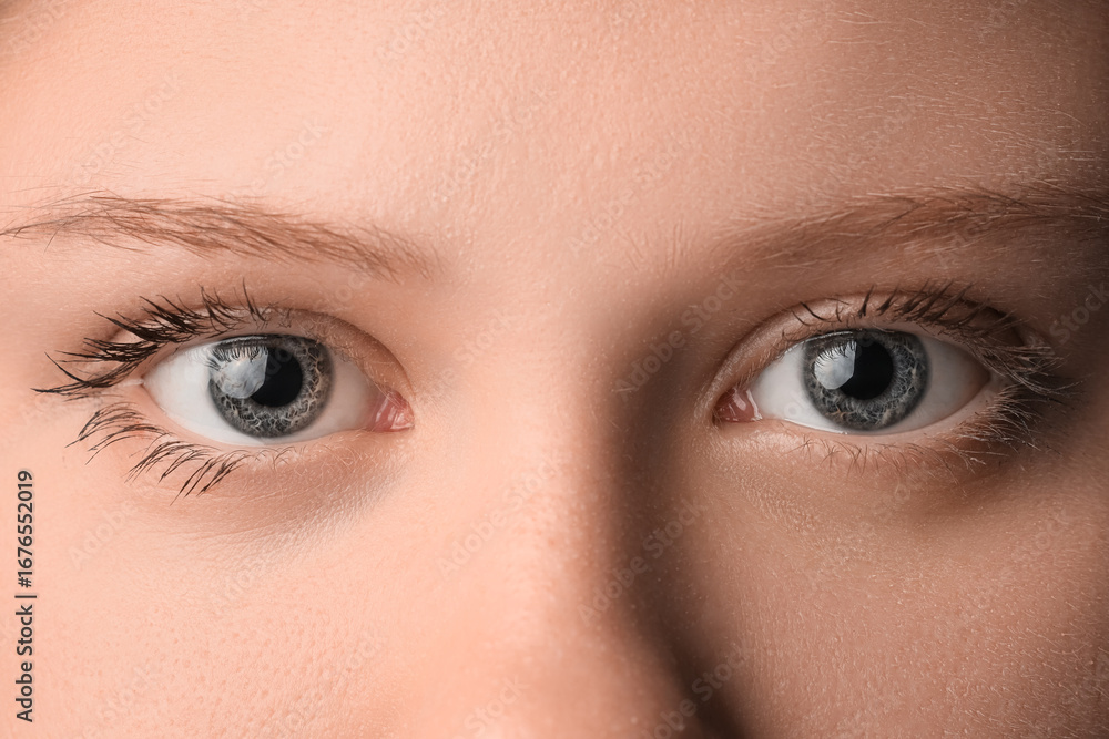 Fototapeta premium Young woman with beautiful eyes, closeup