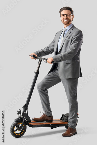 Handsome businessman with e...