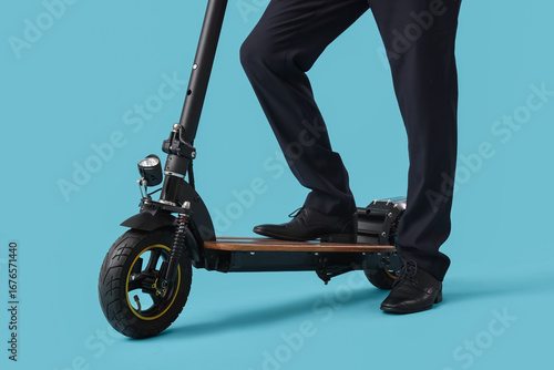 Legs of businessman with el...