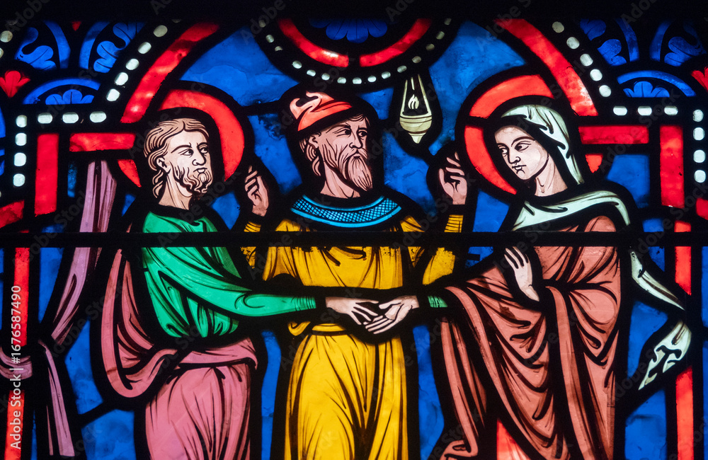 Fototapeta premium Stained glass (19th century) of Holy family: The wedding of Mary and Joseph.