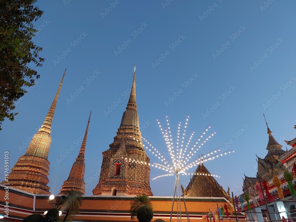 Fototapeta premium Electric lighting decoration for celebrate in Wat pho temple under evening sky