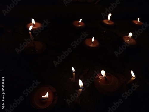 Wallpaper Mural Glow of the candlelight on ground base of Thai temple for celebration and worship Torontodigital.ca