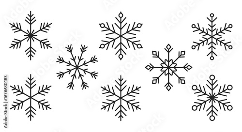 Black and white snowflakes on a plain white background