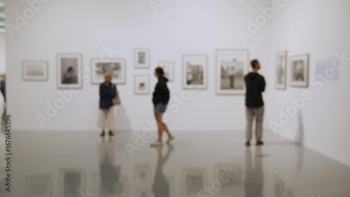 Blurred art gallery and exhibition hall background - soft focus museum interior with artwork displays for creative cultural backdrop.