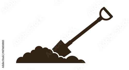 A shovel digging into a pile of dirt on the ground