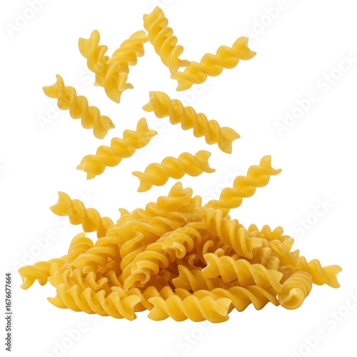 Dry fusilli pasta twists falling and piling up against a stark black backdrop transparent background