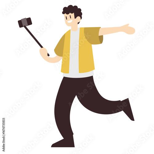 A joyful young man with curly hair happily vlogging or taking a selfie with a stick while walking.