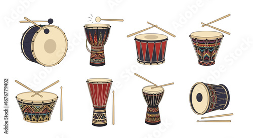 A collection of distinct african percussion instruments with drumsticks for rhythmic music creation
