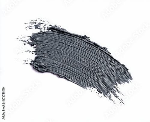 Gray mascara smudge on white background