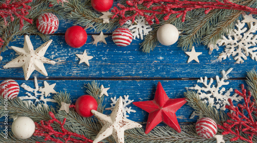 Festive Christmas background with red and white baubles, snowflakes, holly berries, pine branches, and rustic blue wooden backdrop decorated for winter holiday celebration
