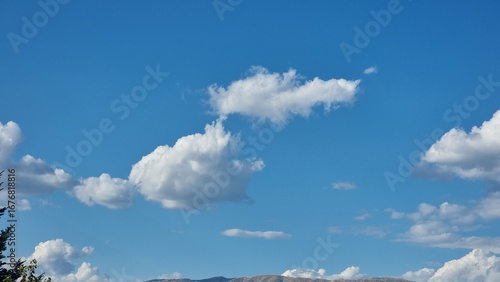 Photography clouds traveling in blue autumn sky