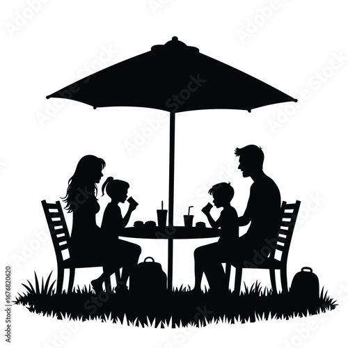 Family enjoying outdoor meal under umbrella silhouette 2